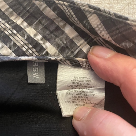 Ashworth Men’s Golf Shorts. Waist size is 35”. Black background with a pattern. - Picture 5 of 6